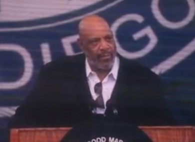 Avery addressing students in 2012.