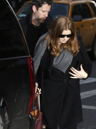 Amy Adams pictured arriving at the wake for the actor, who died last week. 
