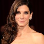 We know you can't see the dress, but look how good Sandra Bullock's face is. <span class=