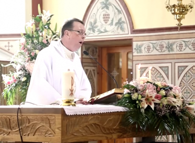 Fr Ray Kelly, giving it socks.