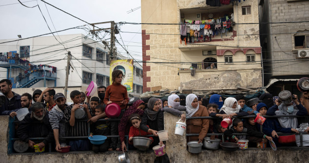 Israel continues to strike Gaza after UN Security Council demands aid be rushed in 'at scale'