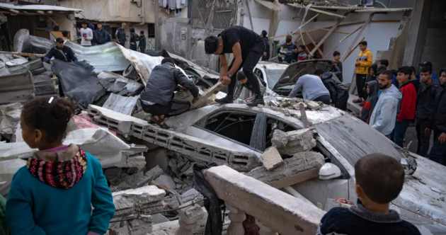 Israeli army bombs scores of targets in Gaza as diplomats press on with efforts to halt fighting