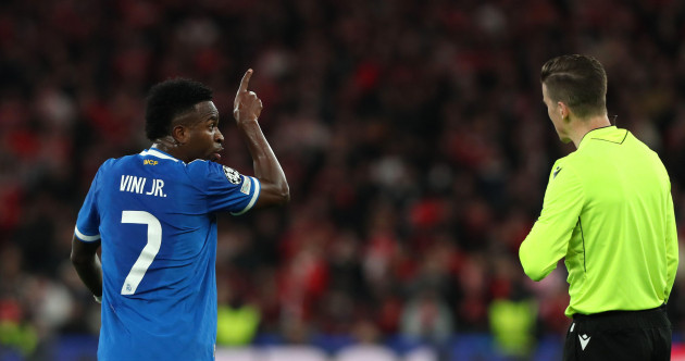 Vinicius stunner helps Real Madrid edge Benfica in play-off marred by alleged racism
