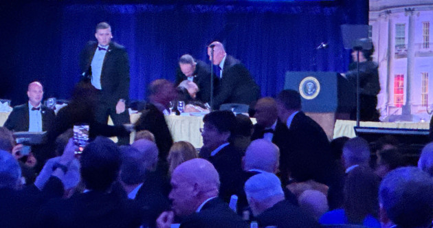 Trump rushed from White House Correspondents' Dinner after gunman fires shots